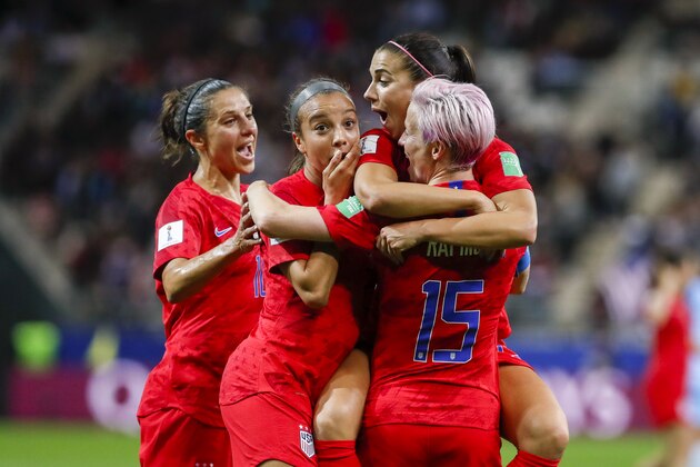 REIMS, FRANCE - JUNE 11: Alex Morgan #13 of USA celebrates her fifth goal with Megan Rapinoe #15, Mallory Pugh #2 and Carli Lloyd #10 of USA during the 2019 FIFA Women's World Cup France group F match between USA and Thailand at Stade Auguste Delaune on June 11, 2019 in Reims, France. (Photo by Catherine Steenkeste/Getty Images)