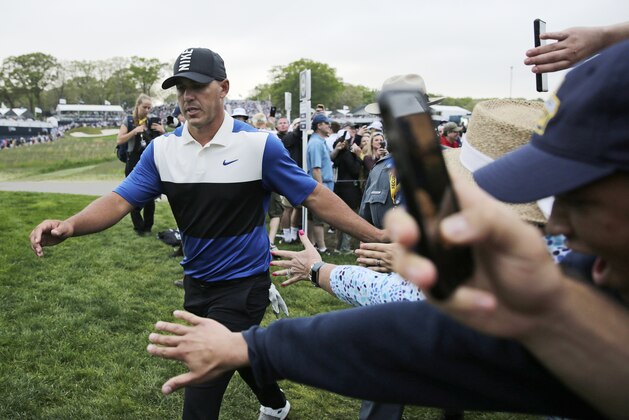 Brooks Koepka walks to the 17th tee during the final round of the PGA Championship golf tournament, Sunday, May 19, 2019, at Bethpage Black in Farmingdale, N.Y. (AP Photo/Charles Krupa)