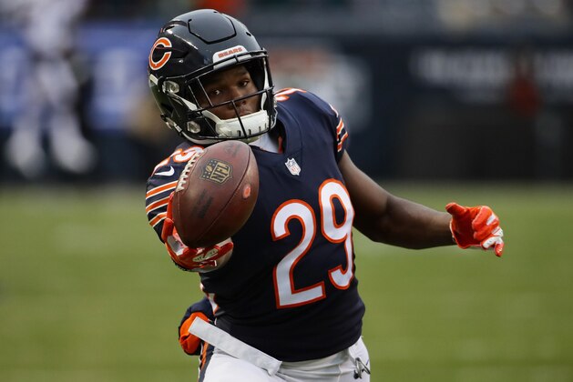 CHICAGO, ILLINOIS - JANUARY 06:  Tarik Cohen #29 of the Chicago Bearswarms up prior to the NFC Wild Card Playoff game against the Philadelphia Eagles at Soldier Field on January 06, 2019 in Chicago, Illinois. (Photo by Jonathan Daniel/Getty Images)