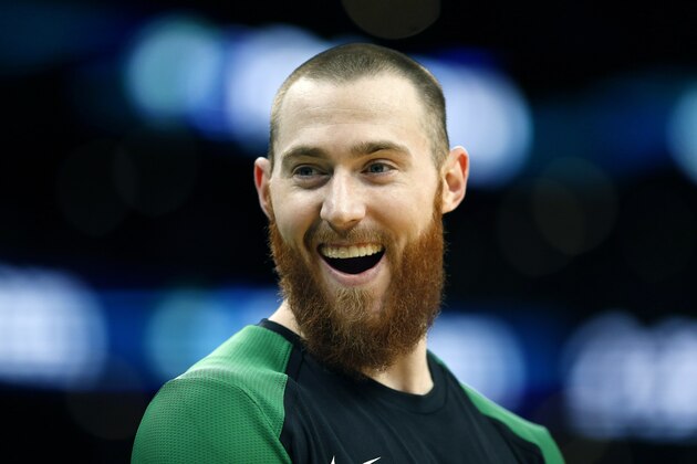 Boston Celtics' Aron Baynes reacts during the second half of an NBA basketball game against the Atlanta Hawks in Boston, Saturday, March 16, 2019. (AP Photo/Michael Dwyer)