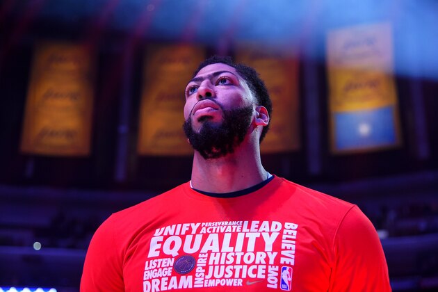 LOS ANGELES, CA - FEBRUARY 27:  Anthony Davis #23 of the New Orleans Pelicans stands for the national anthem before the game against the Los Angeles Lakers on February 27, 2019 at STAPLES Center in Los Angeles, California. NOTE TO USER: User expressly acknowledges and agrees that, by downloading and/or using this Photograph, user is consenting to the terms and conditions of the Getty Images License Agreement. Mandatory Copyright Notice: Copyright 2019 NBAE (Photo by Andrew D. Bernstein/NBAE via Getty Images)