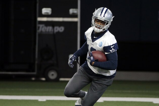 Dallas Cowboys receiver Amari Cooper (19) runs after a pass during NFL football practice in Frisco, Texas, Wednesday, May. 22, 2019. (AP Photo/Michael Ainsworth)