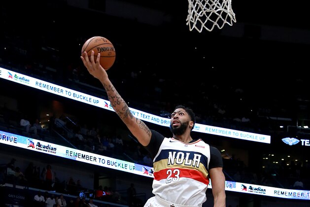 NEW ORLEANS, LOUISIANA - MARCH 24:  Anthony Davis #23 of the New Orleans Pelicans shoots over Clint Capela #15 of the Houston Rockets during the first half at the Smoothie King Center on March 24, 2019 in New Orleans, Louisiana. NOTE TO USER: User expressly acknowledges and agrees that, by downloading and or using this photograph, User is consenting to the terms and conditions of the Getty Images License Agreement. (Photo by Sean Gardner/Getty Images)