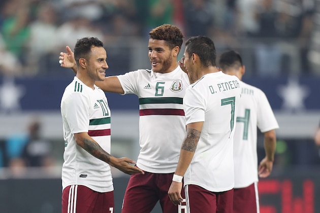 ARLINGTON, TX - JUNE 09: Luis Montes, Jonathan dos Santos and Orbelin Pineda of Mexico celebrate during an international friendly match between Ecuador and Mexico at AT&T Stadium on June 9, 2019 in Arlington, Texas. (Photo by Omar Vega/Getty Images)