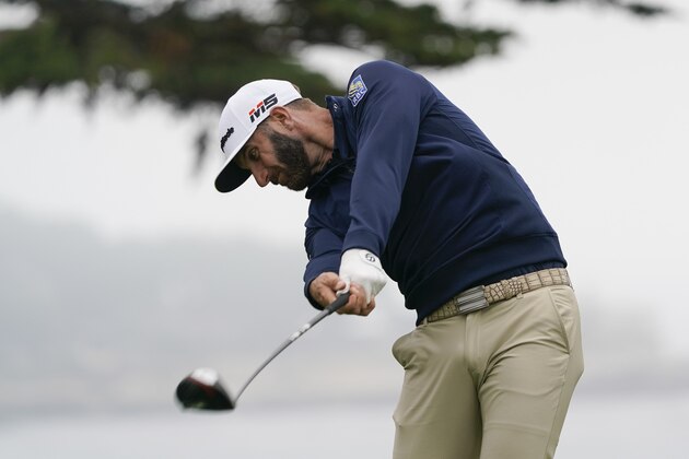 Dustin Johnson hits his tee shot on the 11th hole during a practice round for the U.S. Open Championship golf tournament Wednesday, June 12, 2019, in Pebble Beach, Calif. (AP Photo/David J. Phillip)