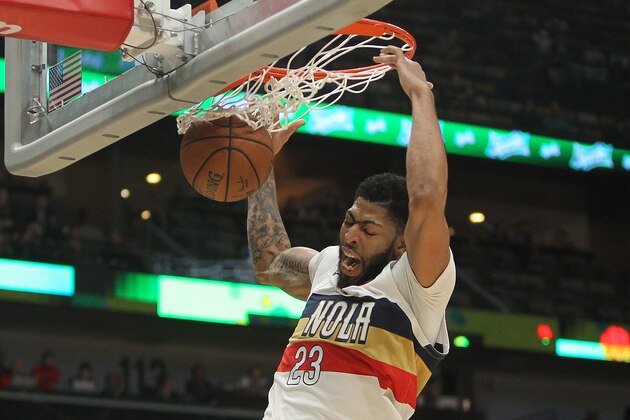 NEW ORLEANS, LOUISIANA - JANUARY 07:  Anthony Davis #23 of the New Orleans Pelicans dunks the ball against the Memphis Grizzlies at Smoothie King Center on January 07, 2019 in New Orleans, Louisiana.  NOTE TO USER: User expressly acknowledges and agrees that, by downloading and or using this photograph, User is consenting to the terms and conditions of the Getty Images License Agreement. (Photo by Chris Graythen/Getty Images)