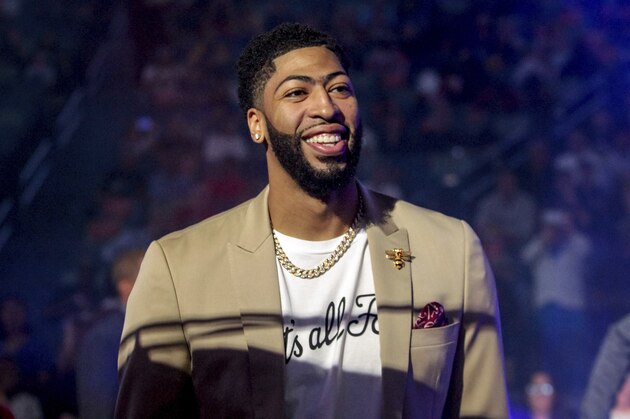 New Orleans Pelicans forward Anthony Davis (23) wears a T-shirt with 'That's All, Folks,' printed on it during player introduction before an NBA basketball game between the New Orleans Pelicans and the Golden State Warriors in New Orleans, Tuesday, April 9, 2019. (AP Photo/Scott Threlkeld)