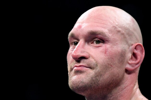 LOS ANGELES, CA - DECEMBER 01:  Tyson Fury reacts after fighting to a draw with Deontay Wilder during the WBC Heavyweight Championship at Staples Center on December 1, 2018 in Los Angeles, California.  (Photo by Harry How/Getty Images)