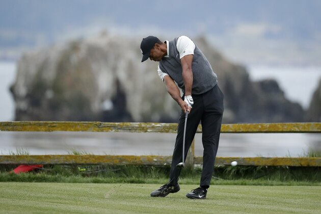 Tiger Woods hits his tee shot on the 18th hole during the first round of the U.S. Open Championship golf tournament Thursday, June 13, 2019, in Pebble Beach, Calif. (AP Photo/Matt York)