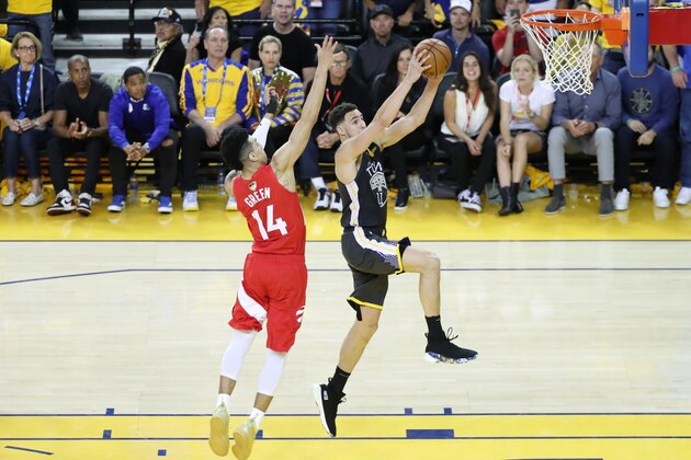 OAKLAND, CA - JUNE 13:  Klay Thompson #11 of the Golden State Warriors goes to the basket against the Toronto Raptors during Game Six of the NBA Finals on June 13, 2019 at ORACLE Arena in Oakland, California. NOTE TO USER: User expressly acknowledges and agrees that, by downloading and/or using this photograph, user is consenting to the terms and conditions of Getty Images License Agreement. Mandatory Copyright Notice: Copyright 2019 NBAE (Photo by Joe Murphy/NBAE via Getty Images)