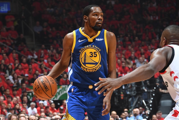 TORONTO, CANADA - JUNE 10: Kevin Durant #35 of the Golden State Warriors handles the ball against the Toronto Raptors  during Game Five of the NBA Finals on June 10, 2019 at Scotiabank Arena in Toronto, Ontario, Canada. NOTE TO USER: User expressly acknowledges and agrees that, by downloading and/or using this photograph, user is consenting to the terms and conditions of the Getty Images License Agreement. Mandatory Copyright Notice: Copyright 2019 NBAE (Photo by Andrew D. Bernstein/NBAE via Getty Images)