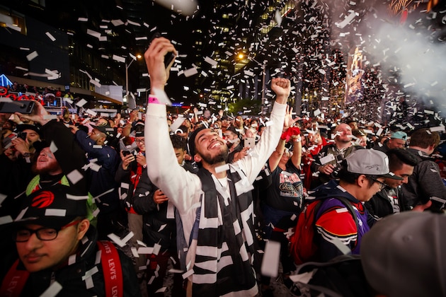 TORONTO, ON - JUNE 13: Toronto Raptors fans cheer after the Raptors defeat the Golden State Warriors in Game Six of the NBA Finals outside of Scotiabank Arena on June 13, 2019 in Toronto, Canada. (Photo by Cole Burston/Getty Images)