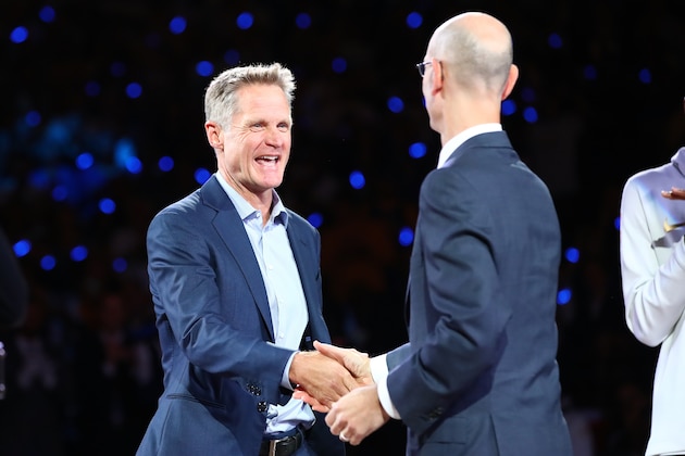 OAKLAND, CA - OCTOBER 17: Head coach Steve Kerr of the Golden State Warriors shakes hands NBA commissioner Adam Silver during their 2017 NBA Championship ring ceremony prior to their NBA game against the Houston Rockets at ORACLE Arena on October 17, 2017 in Oakland, California. NOTE TO USER: User expressly acknowledges and agrees that, by downloading and or using this photograph, User is consenting to the terms and conditions of the Getty Images License Agreement. (Photo by Ezra Shaw/Getty Images) OAKLAND, CA - OCTOBER 17: Head coach Steve Kerr of the Golden State Warriors shakes hands NBA commissioner Adam Silver during their 2017 NBA Championship ring ceremony prior to their NBA game against the Houston Rockets at ORACLE Arena on October 17, 2017 in Oakland, California. NOTE TO USER: User expressly acknowledges and agrees that, by downloading and or using this photograph, User is consenting to the terms and conditions of the Getty Images License Agreement. (Photo by Ezra Shaw/Getty Images)