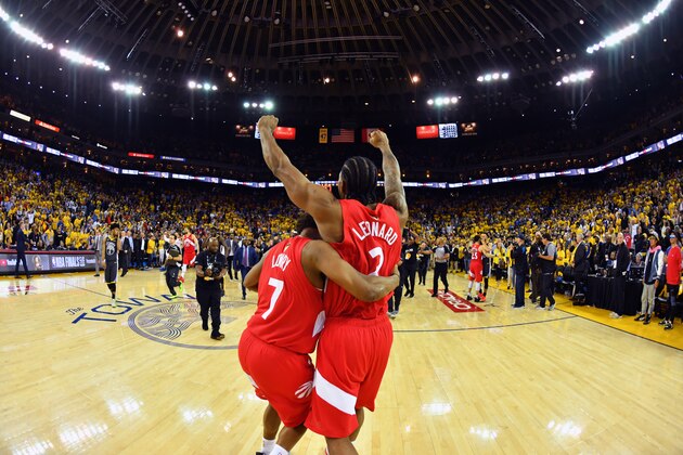 OAKLAND, CA - JUNE 13: Kyle Lowry #7 of the Toronto Raptors and Kawhi Leonard #2 of the Toronto Raptors celebrate after winning the 2019 NBA Championship against the Golden State Warriors during Game Six of the NBA Finals on June 13, 2019 at ORACLE Arena in Oakland, California. NOTE TO USER: User expressly acknowledges and agrees that, by downloading and/or using this photograph, user is consenting to the terms and conditions of Getty Images License Agreement. Mandatory Copyright Notice: Copyright 2019 NBAE (Photo by Jesse D. Garrabrant/NBAE via Getty Images)