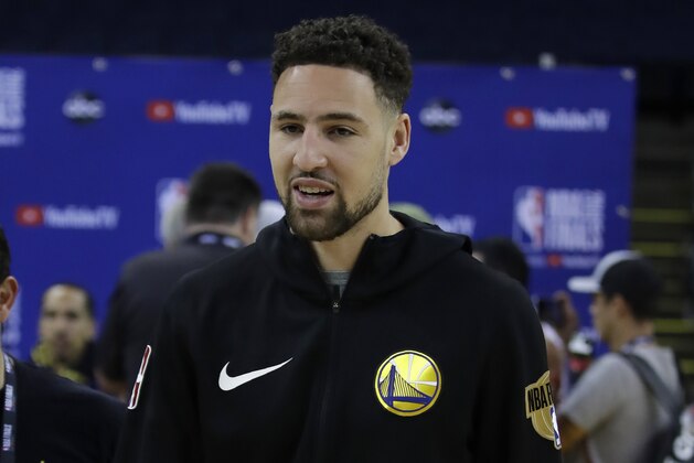Golden State Warriors' Klay Thompson walks off the court after practice for the NBA Finals against the Toronto Raptors Thursday, June 6, 2019, in Oakland, Calif. Game 4 of the NBA Finals is Friday, June 7, 2019 in Oakland, Calif. (AP Photo/Ben Margot)