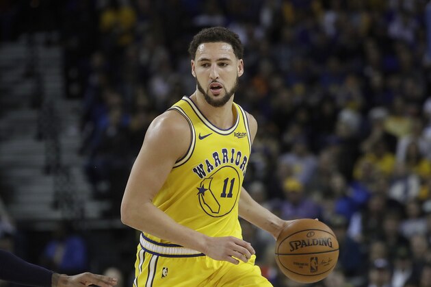 Golden State Warriors guard Klay Thompson (11) against the Denver Nuggets during an NBA basketball game in Oakland, Calif., Tuesday, April 2, 2019. (AP Photo/Jeff Chiu)