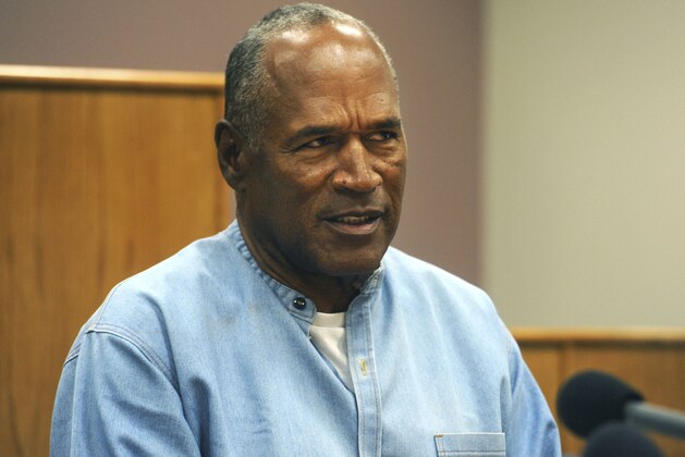 Former NFL football star O.J. Simpson appears via video for his parole hearing at the Lovelock Correctional Center in Lovelock, Nev., on Thursday, July 20, 2017.  Simpson was convicted in 2008 of enlisting some men he barely knew, including two who had guns, to retrieve from two sports collectibles sellers some items that Simpson said were stolen from him a decade earlier.  (Jason Bean/The Reno Gazette-Journal via AP, Pool)