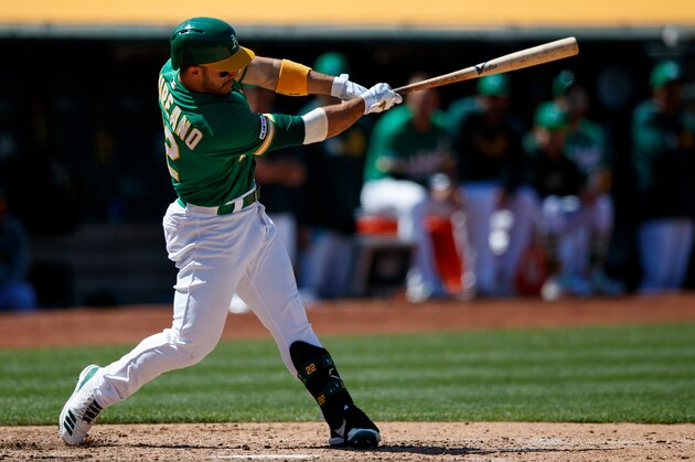OAKLAND, CA - JUNE 02:  Ramon Laureano #22 of the Oakland Athletics hits a home run against the Houston Astros during the seventh inning at the Oakland Coliseum on June 2, 2019 in Oakland, California. The Houston Astros defeated the Oakland Athletics 6-4 in 12 innings. (Photo by Jason O. Watson/Getty Images)