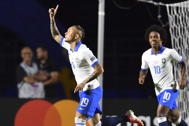 Brazil's Everton (L) celebrates after scoring against Bolivia during their Copa America football tournament group match at the Cicero Pompeu de Toledo Stadium, also known as Morumbi, in Sao Paulo, Brazil, on June 14, 2019. (Photo by Pedro UGARTE / AFP)        (Photo credit should read PEDRO UGARTE/AFP/Getty Images)