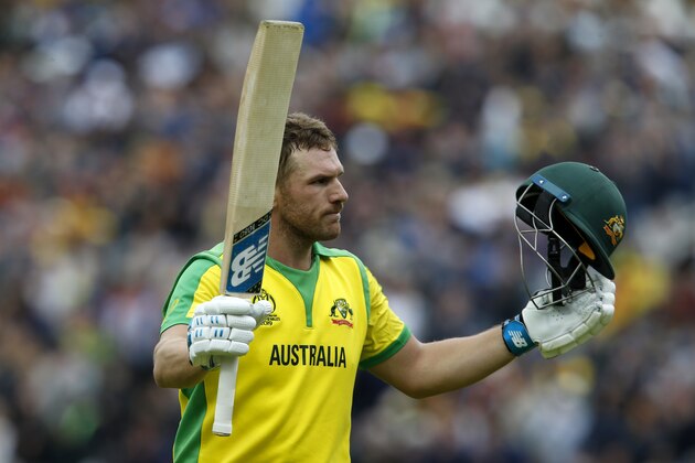 Australia's captain Aaron Finch ackowledges the crowd as he walks off after losing his wicket for 153 during the 2019 Cricket World Cup group stage match between Sri Lanka and Australia at The Oval in London on June 15, 2019. (Photo by Ian KINGTON / AFP) / RESTRICTED TO EDITORIAL USE        (Photo credit should read IAN KINGTON/AFP/Getty Images)