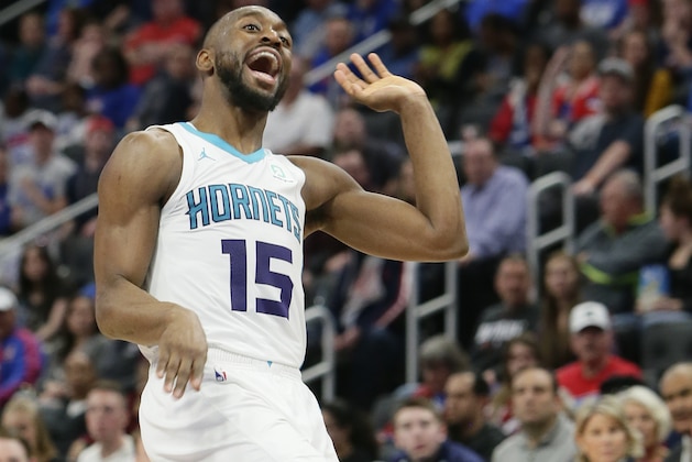 Charlotte Hornets guard Kemba Walker (15) reacts after making a shot against the Detroit Pistons during the second half of an NBA basketball game Sunday, April 7, 2019, in Detroit. (AP Photo/Duane Burleson)