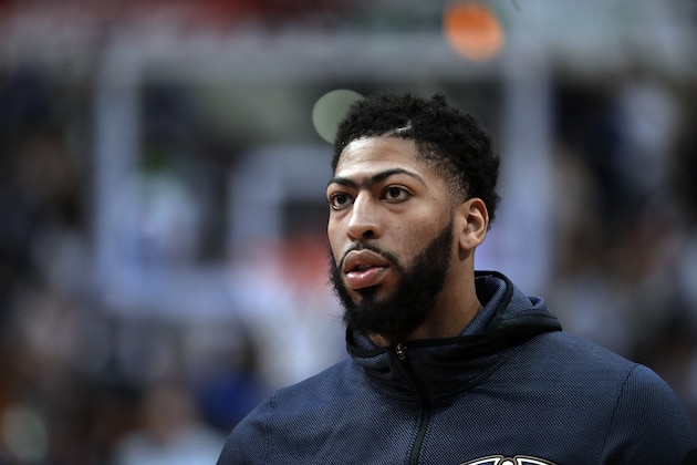 New Orleans Pelicans forward Anthony Davis (23) participates in warm ups before an NBA basketball game against the Dallas Mavericks in Dallas, Monday, March 18, 2019. (AP Photo/Tony Gutierrez)