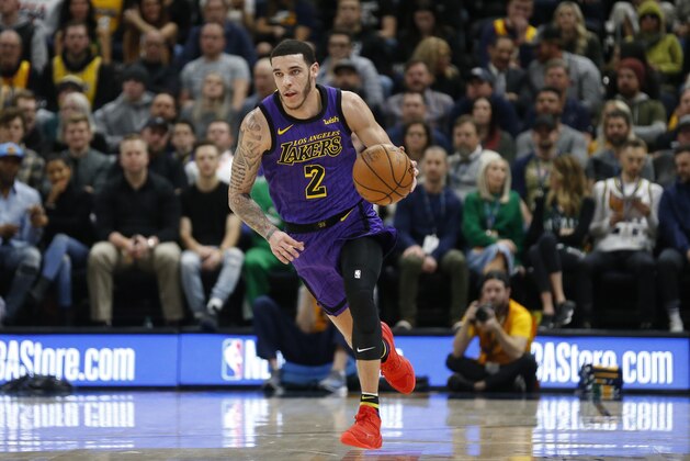 Los Angeles Lakers guard Lonzo Ball (2) brings the ball up court during the first half of an NBA basketball game against the Utah Jazz Friday, Jan. 11, 2019, in Salt Lake City. (AP Photo/Rick Bowmer)