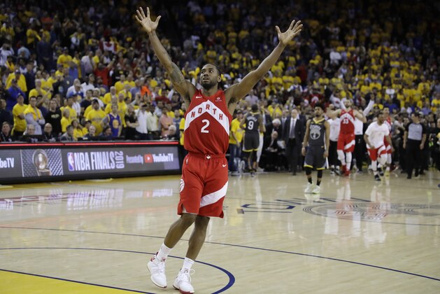 Toronto Raptors forward Kawhi Leonard celebrates after the Raptors defeat the Golden State Warriors 114-110 in Game 6 of basketball's NBA Finals in Oakland, Calif., Thursday, June 13, 2019. (AP Photo/Ben Margot)