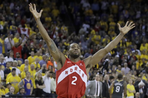 Toronto Raptors forward Kawhi Leonard celebrates after the Raptors defeated the Golden State Warriors in Game 6 of basketball's NBA Finals in Oakland, Calif., Thursday, June 13, 2019. (AP Photo/Ben Margot)