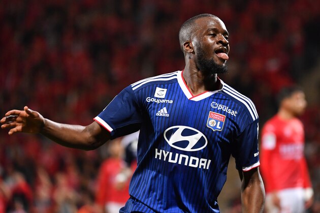 Lyon's French forward Tanguy NDombele Alvaro celebrates after scoring a goal during the French L1 football match between Nimes Olympique and Olympique Lyonnais (OL) at the Costieres stadium in Nimes, on May 24, 2019. (Photo by Pascal GUYOT / AFP)        (Photo credit should read PASCAL GUYOT/AFP/Getty Images)