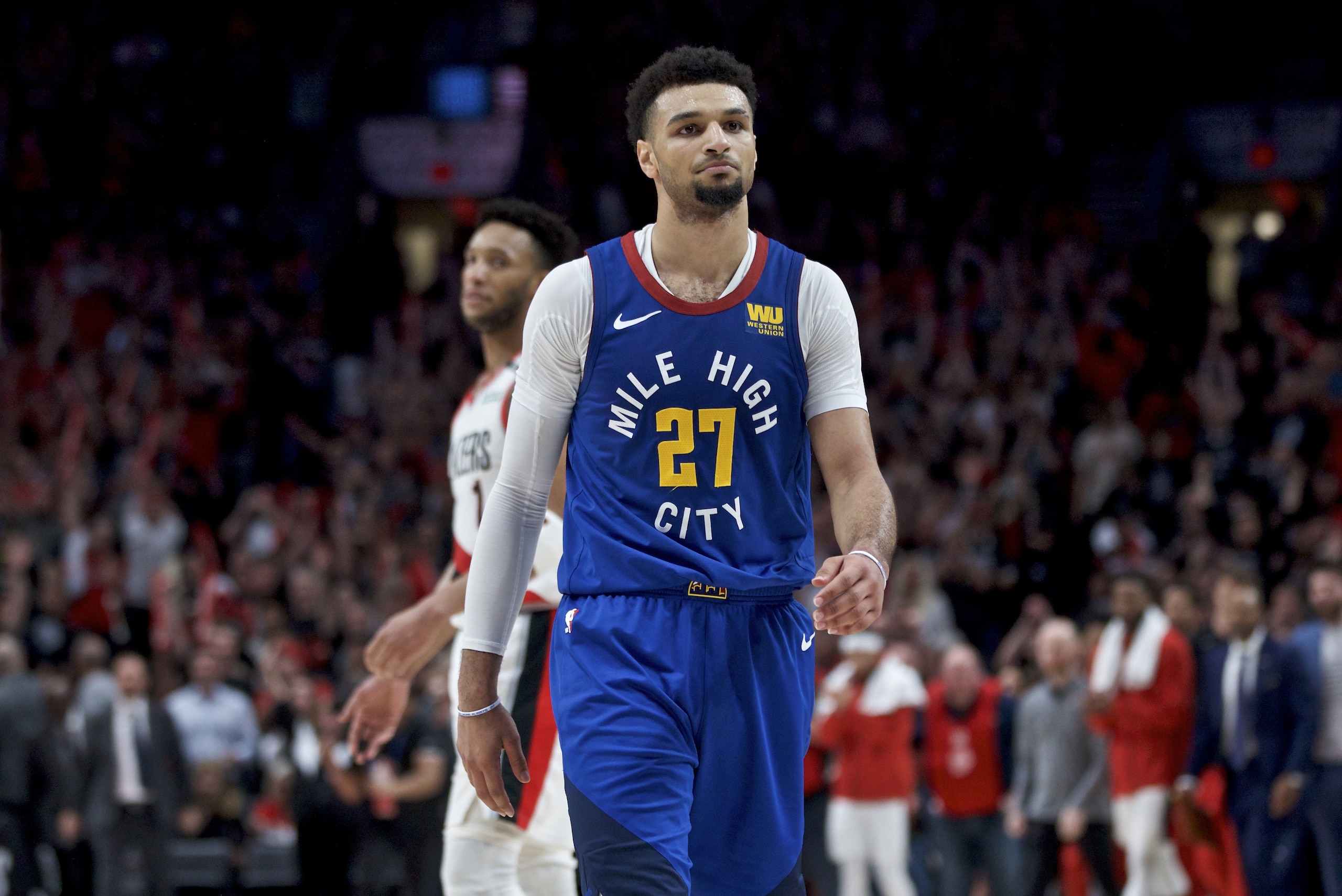 Denver Nuggets guard Jamal Murray walks off the court after the team's loss to the Portland Trail Blazers in Game 6 of an NBA basketball second-round playoff series Thursday, May 9, 2019, in Portland, Ore. The Trail Blazers won 119-108. (AP Photo/Craig Mitchelldyer) Denver Nuggets guard Jamal Murray walks off the court after the team's loss to the Portland Trail Blazers in Game 6 of an NBA basketball second-round playoff series Thursday, May 9, 2019, in Portland, Ore. The Trail Blazers won 119-108. (AP Photo/Craig Mitchelldyer)