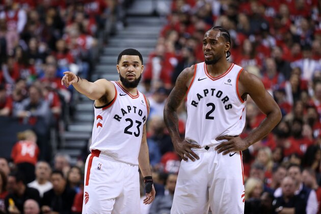 TORONTO, CANADA - APRIL 13:  Fred VanVleet #23 and Kawhi Leonard #2 of the Toronto Raptors look on during Game One of Round One of the 2019 NBA Playoffs on April 13, 2019 at the Scotiabank Arena in Toronto, Ontario, Canada.  NOTE TO USER: User expressly acknowledges and agrees that, by downloading and or using this Photograph, user is consenting to the terms and conditions of the Getty Images License Agreement.  Mandatory Copyright Notice: Copyright 2019 NBAE (Photo by David Sherman/NBAE via Getty Images)