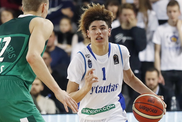 BC Prienu Vytautas's LaMelo Ball in action during the Big Baller Brand Challenge friendly tournament match between BC Prienu Vytautas and BC Zalgiris-2 at the BC Prienai-Birstonas Vytautas arena, in Prienai, Lithuania, Tuesday, Jan. 9, 2018. LiAngelo Ball and LaMelo Ball, sons of former basketball player LaVar Ball, have signed a one-year contract and play their first match for Lithuanian professional basketball club Prienu Vytautas. (AP Photo/Liusjenas Kulbis)