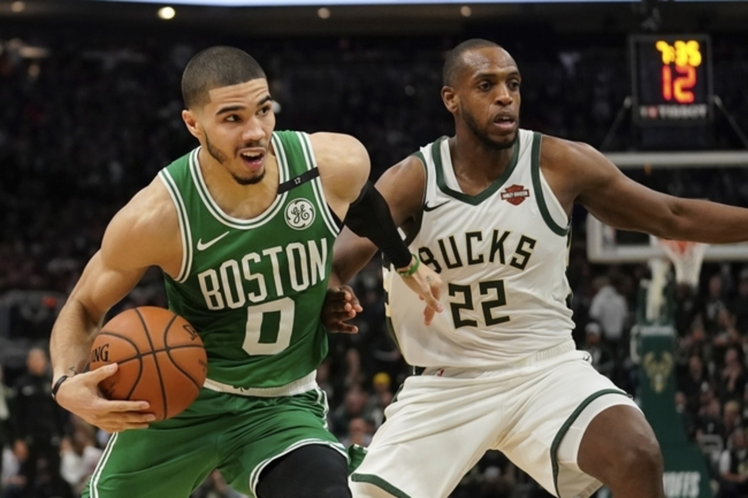 Boston Celtics' Jayson Tatum tries to drive past Milwaukee Bucks' Khris Middleton during the second half of Game 5 of a second round NBA basketball playoff series Wednesday, May 8, 2019, in Milwaukee. The Bucks won 116-91 to win the series. (AP Photo/Morry Gash)