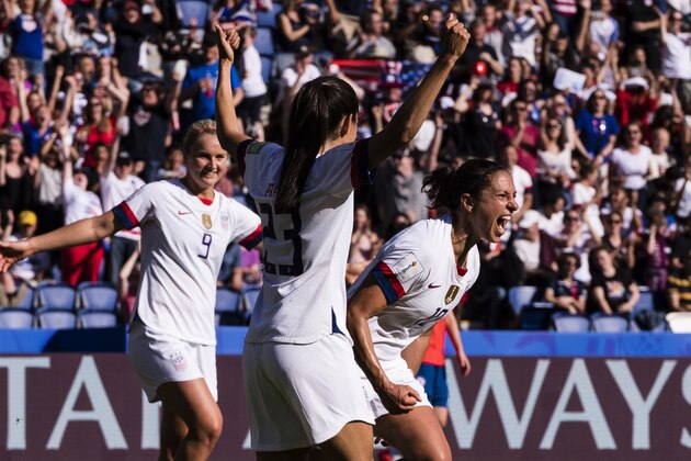 PARIS, FRANCE - JUNE 16: Carli Lloyd of United States (R) celebrates her goal during the 2019 FIFA Women's World Cup France group F match between USA and Chile at Parc des Princes on June 16, 2019 in Paris, France. (Photo by Marcio Machado/Getty Images)
