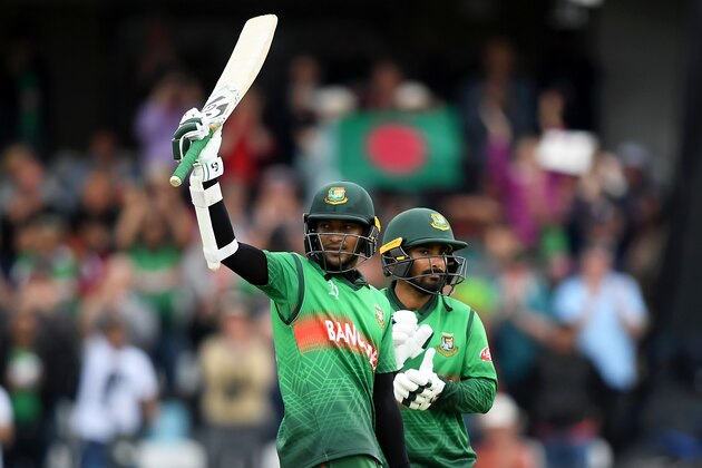 TAUNTON, ENGLAND - JUNE 17: Shakib Al Hasan of Bangladesh celebrates his century with Liton Das of Bangladesh during the Group Stage match of the ICC Cricket World Cup 2019 between West Indies and Bangladesh at The County Ground on June 17, 2019 in Taunton, England. (Photo by Alex Davidson/Getty Images)