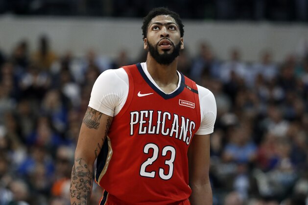 New Orleans Pelicans' Anthony Davis walks on the court during an NBA basketball game against the Dallas Mavericks in Dallas, Monday, March 18, 2019. (AP Photo/Tony Gutierrez)