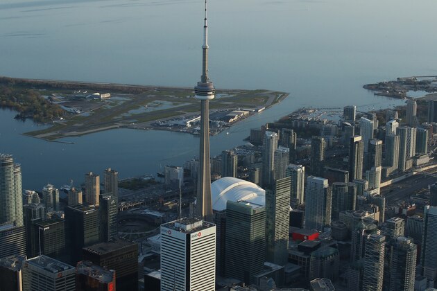 TORONTO, CANADA - MAY 3: An aerial view of the Toronto city skyline and downtown buildings and Islands and Lake Ontario in the background on May 3, 2017 in Toronto, Ontario, Canada. (Photo by Tom Szczerbowski/Getty Images) *** Local Caption ***