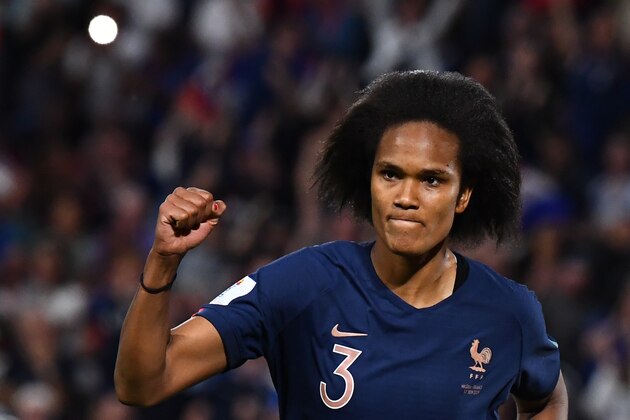 TOPSHOT - France's defender Wendie Renard celebrates after scoring a penalty kick  during the France 2019 Women's World Cup Group A football match between Nigeria and France, on June 17, 2019, at the Roazhon Park stadium in Rennes, western France. (Photo by FRANCK FIFE / AFP)        (Photo credit should read FRANCK FIFE/AFP/Getty Images)