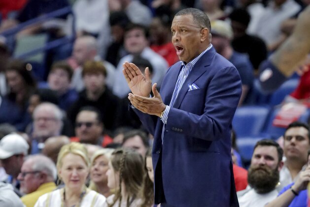 New Orleans Pelicans head coach Alvin Gentry encourages his team in the first half of an NBA basketball game against the Golden State Warriors in New Orleans, Tuesday, April 9, 2019. (AP Photo/Scott Threlkeld)