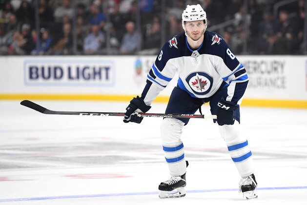 LOS ANGELES, CALIFORNIA - MARCH 18:  Jacob Trouba #8 of the Winnipeg Jets waits for a pass during a 3-1 win over the Los Angeles Kings at Staples Center on March 18, 2019 in Los Angeles, California. (Photo by Harry How/Getty Images)