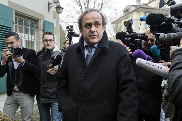 Journalists surround UEFA president and FIFA vice president Michel Platini as he arrives at the Court of Arbitration for Sport (CAS) to appeal against a 90-day suspension in Lausanne on December 8, 2015.
The appeal is part of a new campaign by Platini to get back into the election for a new FIFA leader on February 26.  / AFP PHOTO / FABRICE COFFRINI        (Photo credit should read FABRICE COFFRINI/AFP/Getty Images)