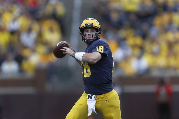 Michigan quarterback Brandon Peters throws in the second half of an NCAA football game against Nebraska in Ann Arbor, Mich., Saturday, Sept. 22, 2018. Michigan won 56-10. (AP Photo/Paul Sancya)