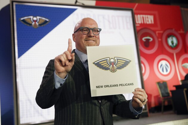 David Griffin, Executive Vice President of basketball operations for the New Orleans Pelicans holds up a placard after it was announced that his team had won the first pick during the NBA basketball draft lottery Tuesday, May 14, 2019, in Chicago. (AP Photo/Nuccio DiNuzzo)