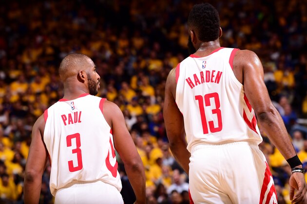 OAKLAND, CA - APRIL 30: Chris Paul #3 and James Harden #13 of the Houston Rockets look on during Game Two of the Western Conference Semifinals of the 2019 NBA Playoffs against the Golden State Warriors on April 30, 2019 at ORACLE Arena in Oakland, California. NOTE TO USER: User expressly acknowledges and agrees that, by downloading and or using this photograph, user is consenting to the terms and conditions of Getty Images License Agreement. Mandatory Copyright Notice: Copyright 2019 NBAE (Photo by Noah Graham/NBAE via Getty Images)