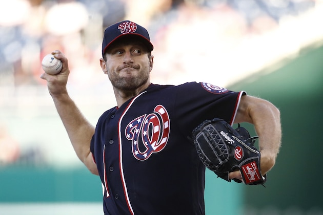 Washington Nationals starting pitcher Max Scherzer throws to an Arizona Diamondbacks batter during the first inning of a baseball game Friday, June 14, 2019, in Washington. (AP Photo/Patrick Semansky)