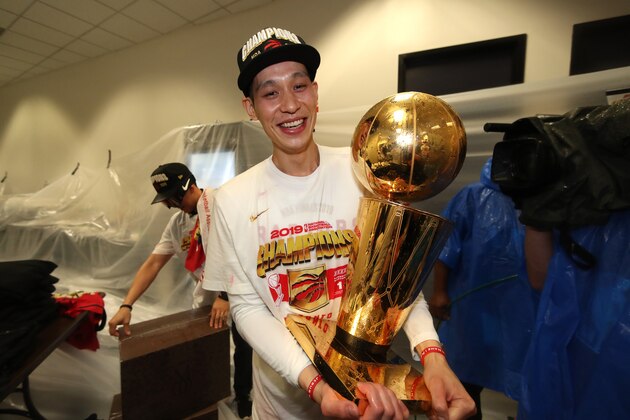 OAKLAND, CA - JUNE 13: Jeremy Lin #17 of the Toronto Raptors holds the Larry O'Brien Championship Trophy in the locker room after defeating the Golden State Warriors in Game Six of the 2019 NBA Finals on June 13, 2019 at ORACLE Arena in Oakland, California. NOTE TO USER: User expressly acknowledges and agrees that, by downloading and/or using this photograph, user is consenting to the terms and conditions of Getty Images License Agreement. Mandatory Copyright Notice: Copyright 2019 NBAE (Photo by Nathaniel S. Butler/NBAE via Getty Images)