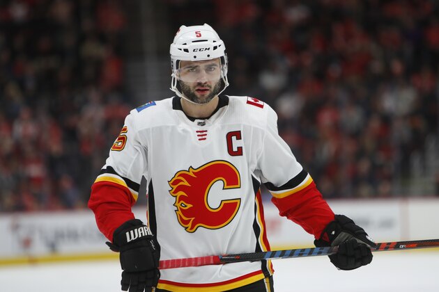Calgary Flames defenseman Mark Giordano plays against the Detroit Red Wings in the second period of an NHL hockey game Wednesday, Jan. 2, 2019, in Detroit. (AP Photo/Paul Sancya)
