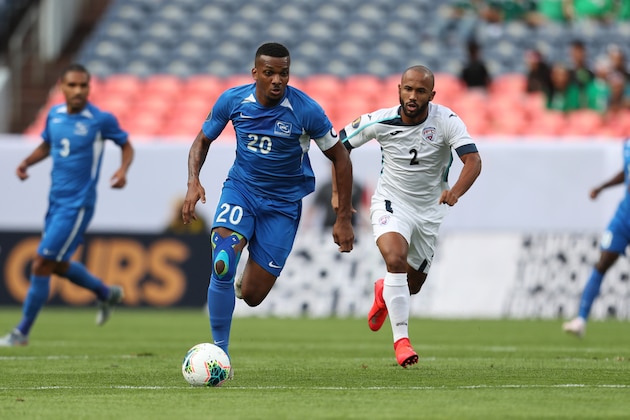 DENVER, CO - JUNE 19: Stephane Abaul #20 of Martinique controls the ball during the Group A match between Cuba and Martinique as part of the 2019 CONCACAF Gold Cup at Sports Authority Field at Mile High on June 19, 2019 in Denver, Colorado. (Photo by Omar Vega/Getty Images)
