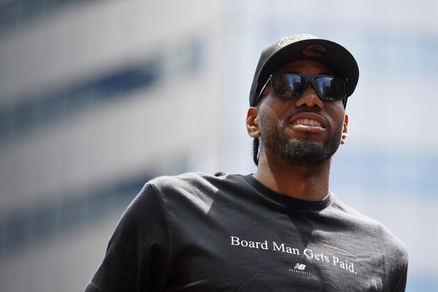 TORONTO, ON - JUNE 17:  Kawhi Leonard #2 of the Toronto Raptors looks on from the team bus during the Toronto Raptors Championship Victory Parade on June 17, 2019 in Toronto, Ontario. NOTE TO USER: User expressly acknowledges and agrees that, by downloading and/or using this photograph, user is consenting to the terms and conditions of Getty Images License Agreement. Mandatory Copyright Notice: Copyright 2019 NBAE (Photo by Mark Blinch/NBAE via Getty Images)